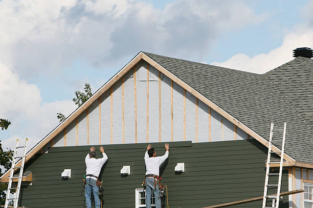 Professional Siding Contractor technician working in Babson Park, MA